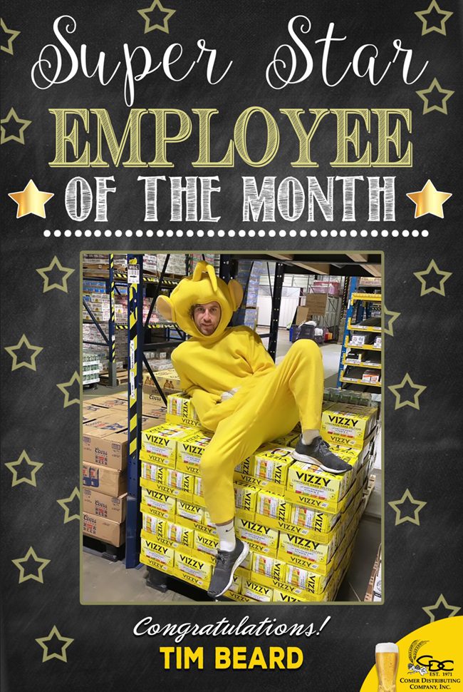 A picture of our employee of the month, Tim Beard, dressed up as a Teletubbie and sitting on a case of Vizzy hard seltzer.